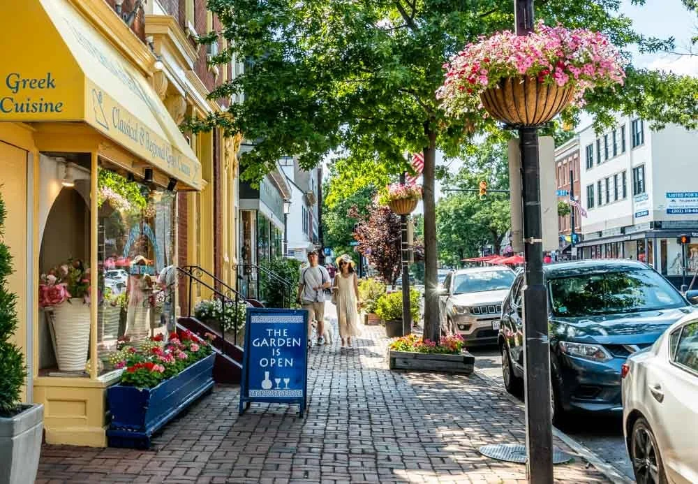 alexandria street image with cars and greek cuisine shop